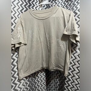 Neutral Beige Graphic Crop Tee with skeletons skateboarding